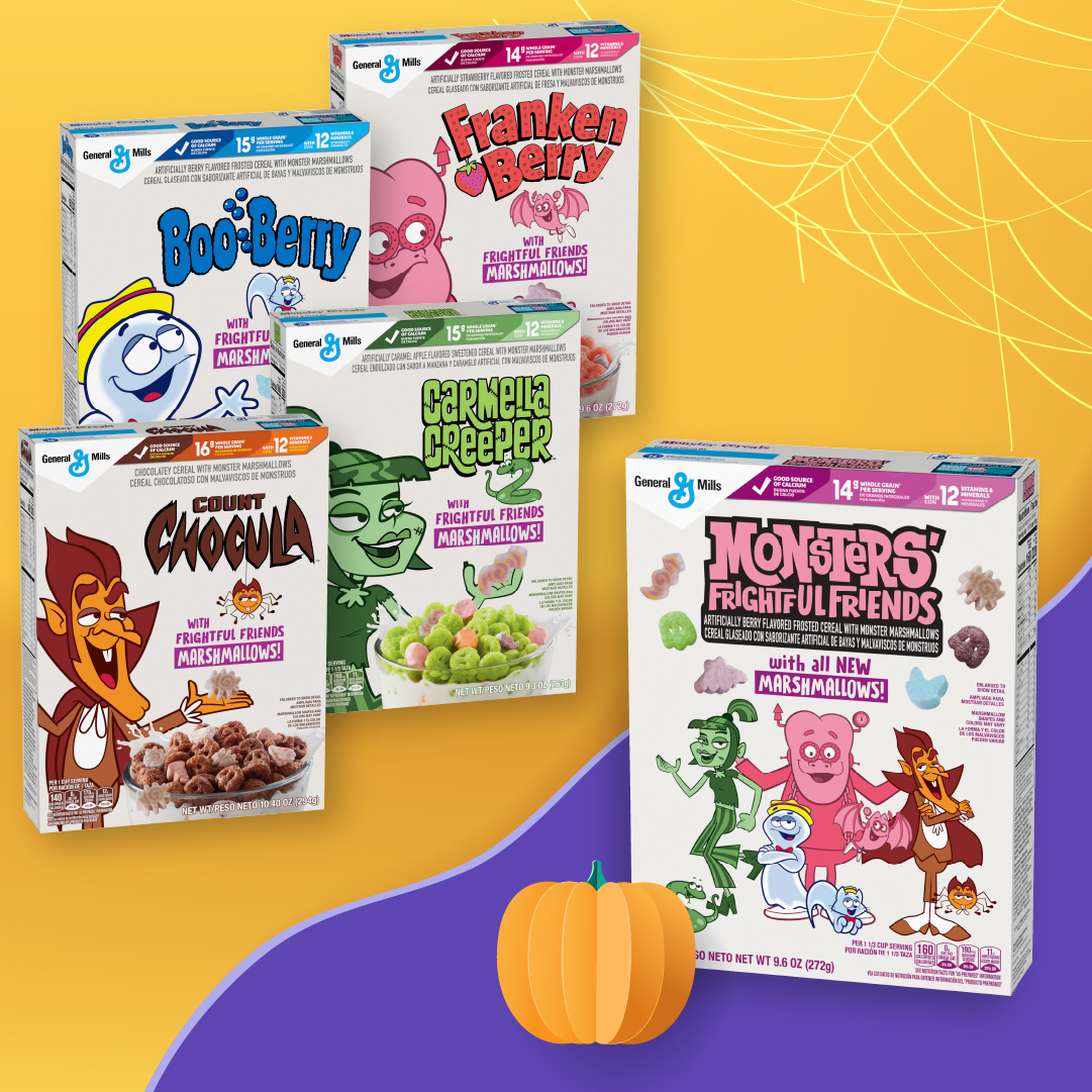 Four Monsters Cereal boxes and the new Monsters' Frightful Friends Cereal box displayed on a yellow and purple background with spider web and pumpkin illustrations.